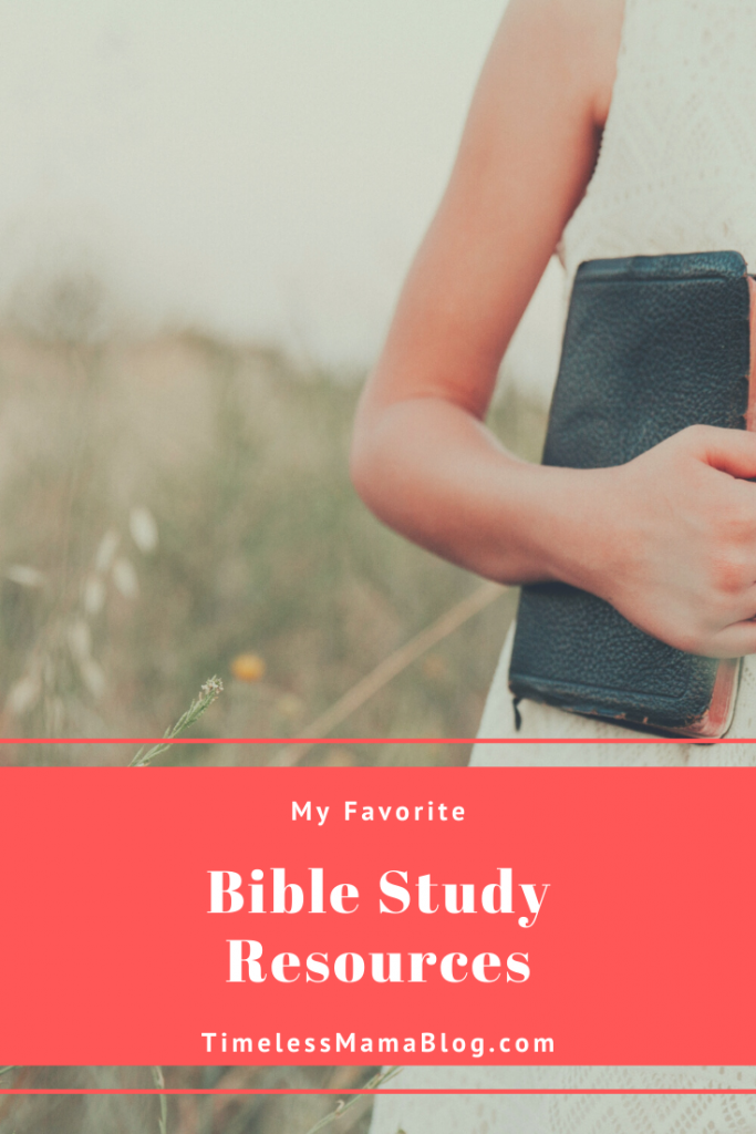 bible study resources, girl holding a bible in a field