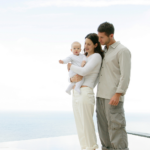 parents holding small child